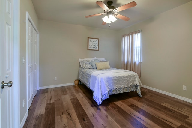 bedroom featuring hardwood / wood-style flooring and ceiling fan