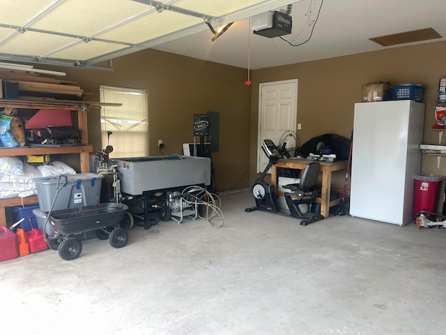 garage featuring a garage door opener