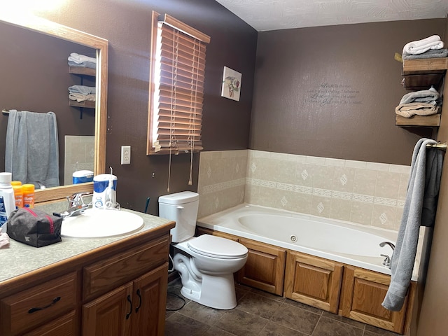 bathroom with tile patterned floors, toilet, a textured ceiling, vanity, and a bath