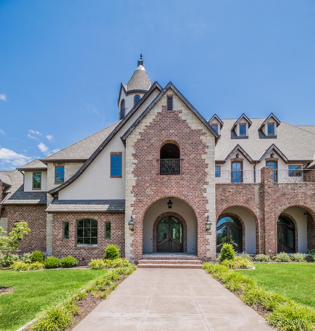 french country home with a front yard