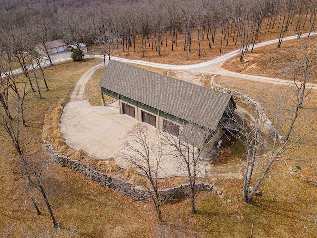 birds eye view of property with a rural view