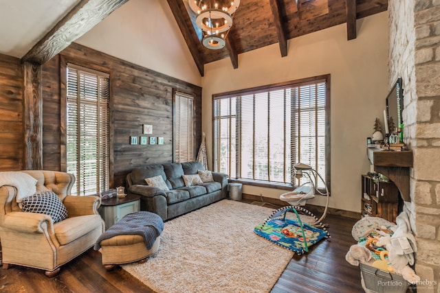 living room featuring beamed ceiling, dark hardwood / wood-style floors, a healthy amount of sunlight, and high vaulted ceiling