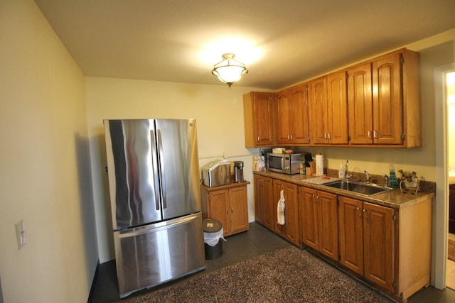 kitchen with sink and appliances with stainless steel finishes