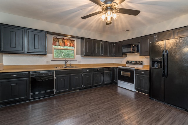 kitchen with black appliances, ceiling fan, sink, and dark hardwood / wood-style floors