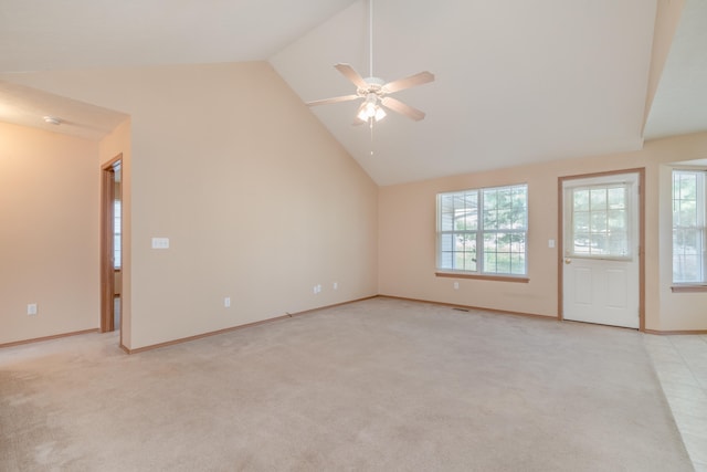 unfurnished living room with ceiling fan, light carpet, and high vaulted ceiling