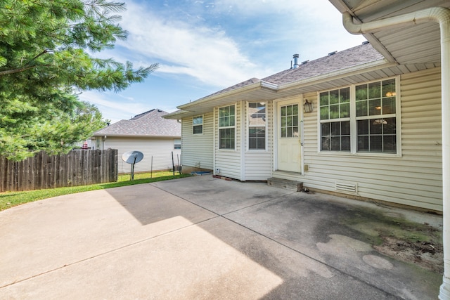 rear view of property with a patio