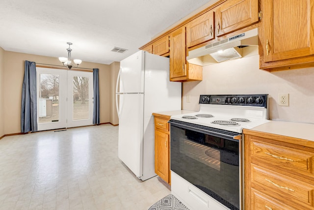 kitchen with white appliances, a chandelier, a textured ceiling, and pendant lighting