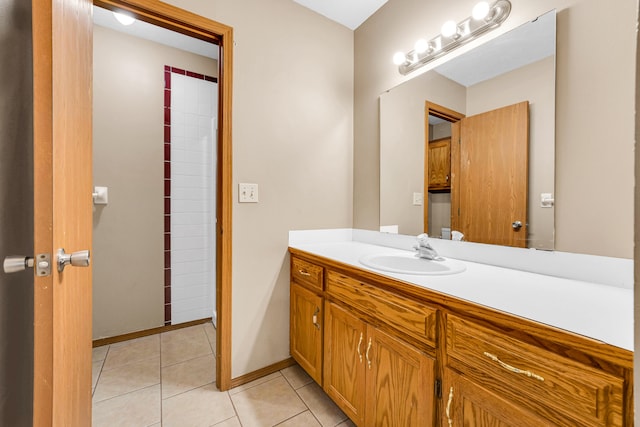 bathroom with vanity and tile patterned flooring