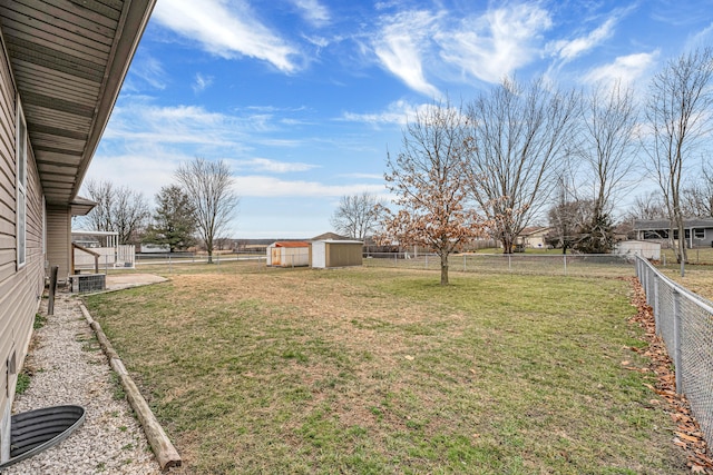 view of yard with a shed and cooling unit