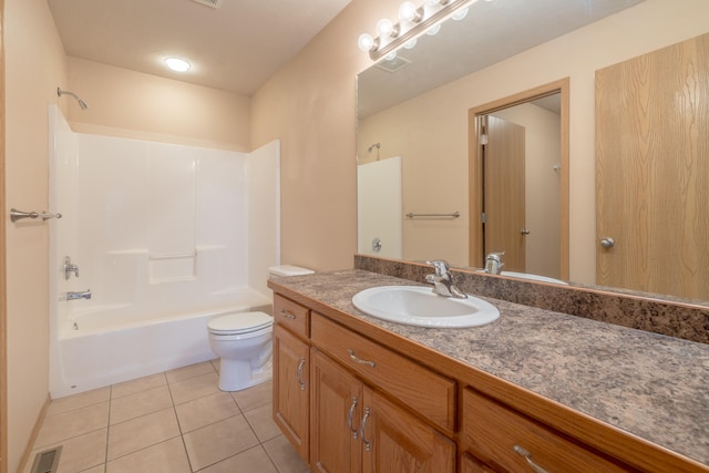 full bathroom with vanity, tile patterned floors, toilet, and shower / bath combination