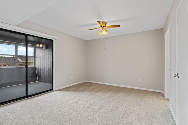 empty room with light colored carpet and ceiling fan