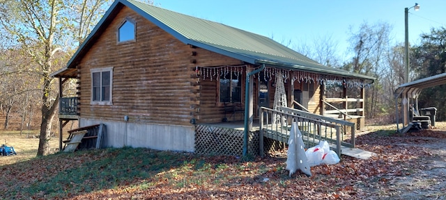 exterior space featuring a deck