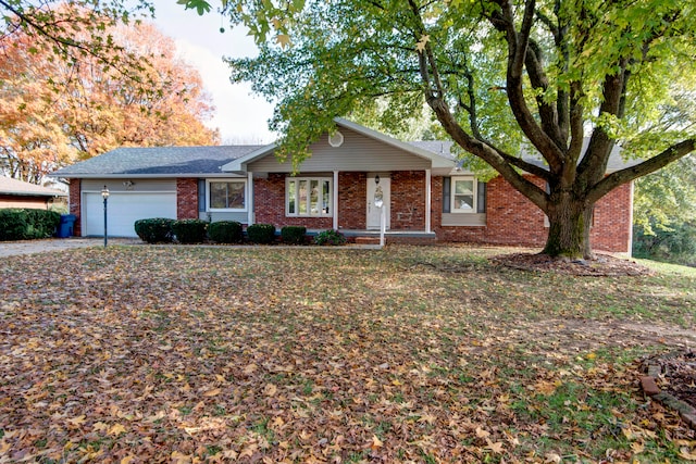 single story home with a garage