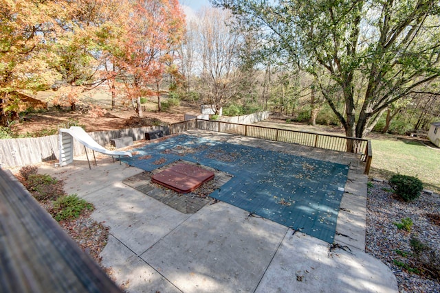 view of pool featuring a patio area