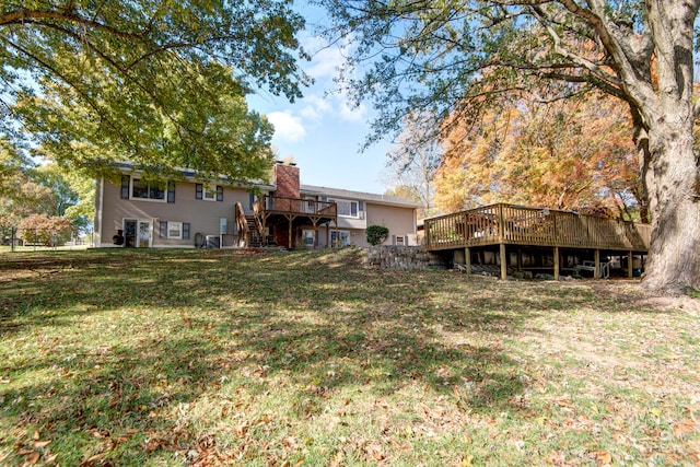 view of yard with a deck