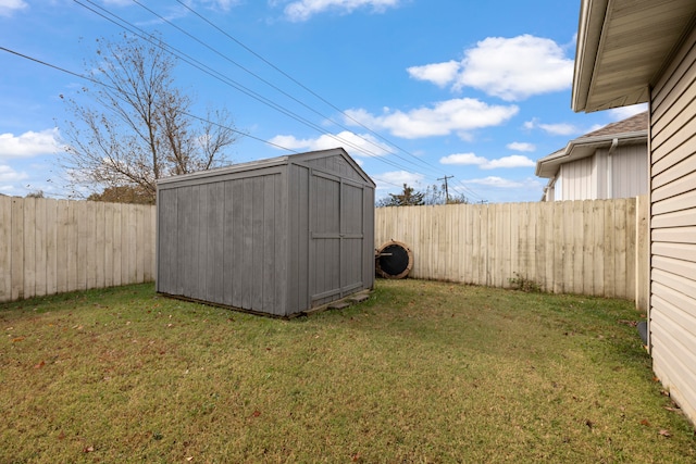 view of outbuilding with a lawn