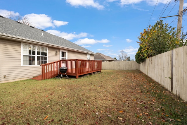 view of yard featuring a wooden deck