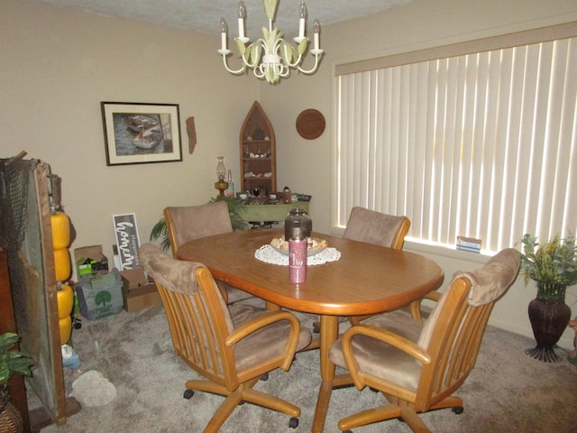 27038 Hickory Dr, Eagle Rock, MO 65641 - carpeted dining room featuring a chandelier