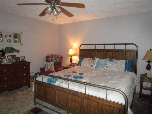 27038 Hickory Dr, Eagle Rock, MO 65641 - carpeted bedroom with a ceiling fan
