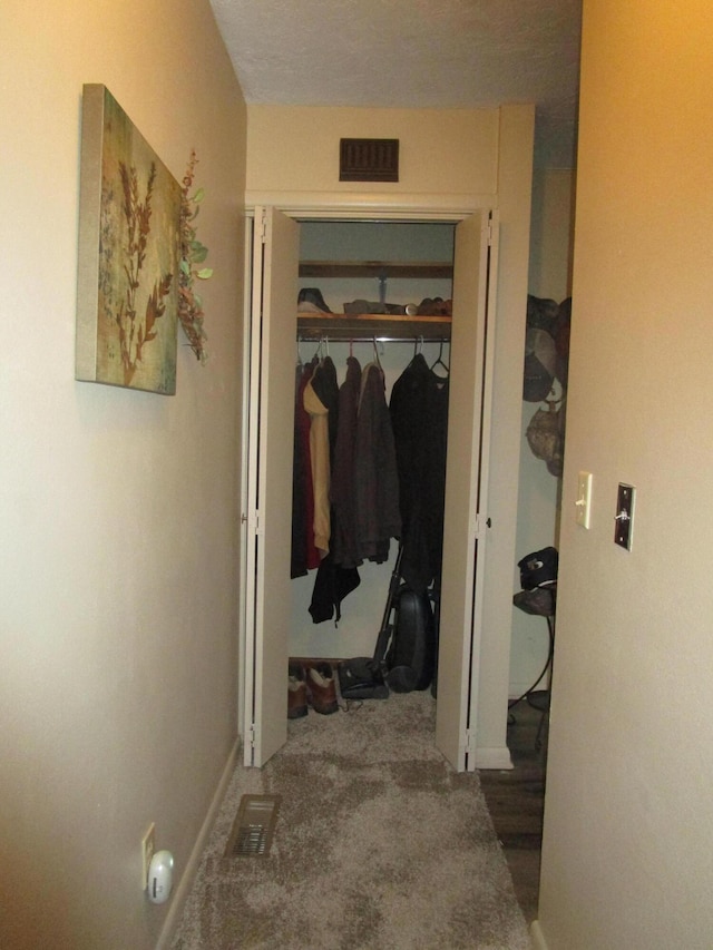 27038 Hickory Dr, Eagle Rock, MO 65641 - hall featuring carpet and baseboards