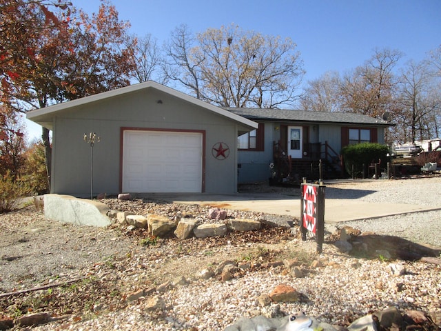 27038 Hickory Dr, Eagle Rock, MO 65641 - ranch-style home featuring concrete driveway