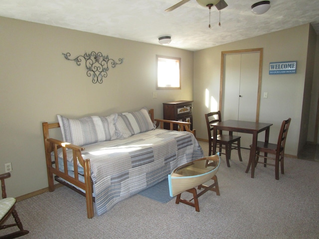 27038 Hickory Dr, Eagle Rock, MO 65641 - bedroom featuring carpet and ceiling fan