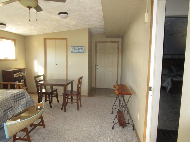 27038 Hickory Dr, Eagle Rock, MO 65641 - carpeted dining room featuring a ceiling fan