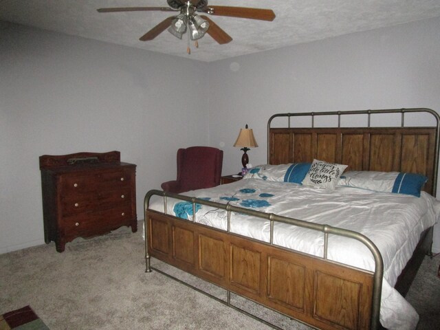 27038 Hickory Dr, Eagle Rock, MO 65641 - bedroom with light colored carpet and ceiling fan