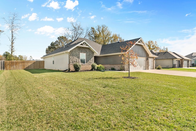 view of front facade featuring a garage and a front yard