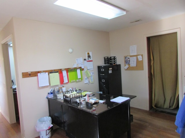 home office featuring dark hardwood / wood-style flooring