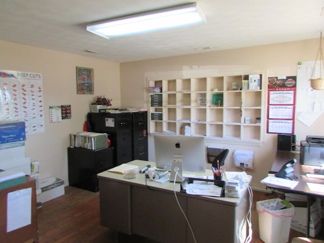 office space with dark wood-type flooring