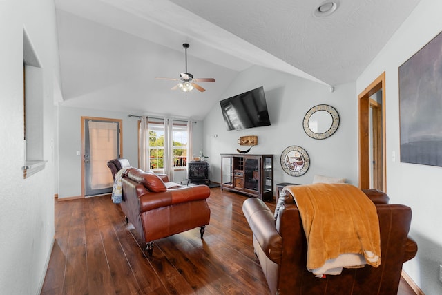 living room featuring dark hardwood / wood-style flooring, lofted ceiling, and ceiling fan