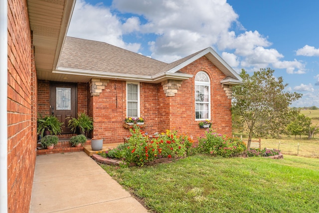 exterior space with a yard