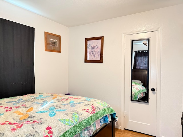 bedroom featuring light wood-type flooring