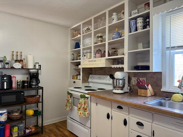 kitchen featuring white range with electric cooktop, white cabinets, decorative backsplash, sink, and dark hardwood / wood-style floors