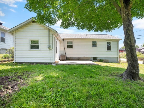 603 E Maupin St, Bolivar, MO 65613 - rear view of property with a patio area and cooling unit