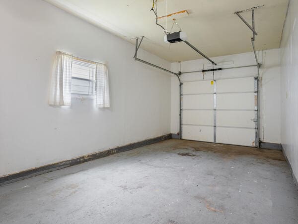 603 E Maupin St, Bolivar, MO 65613 - garage with a garage door opener