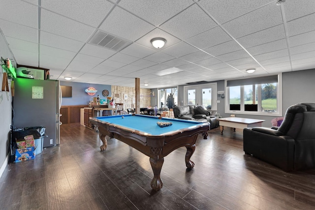 game room with a paneled ceiling, french doors, dark hardwood / wood-style floors, and billiards