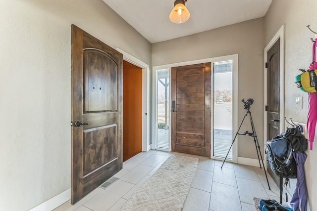 view of tiled entrance foyer