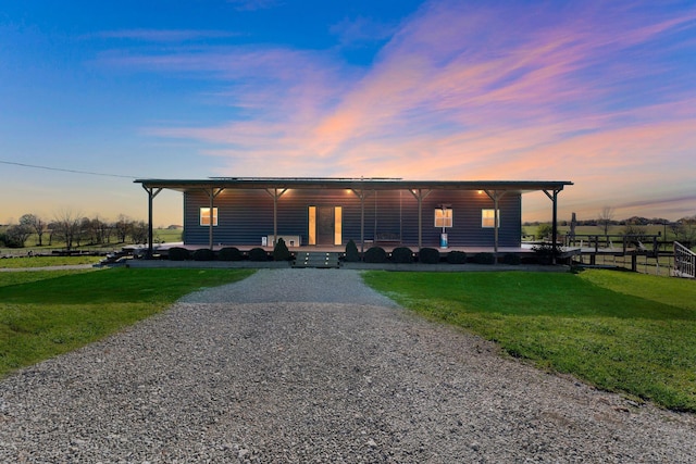 view of front of house with a lawn