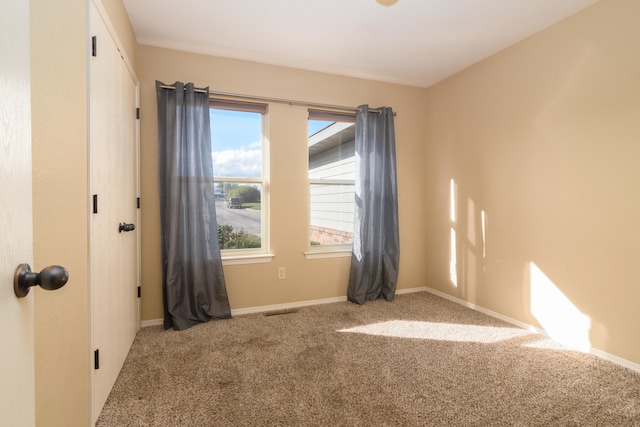 view of carpeted empty room