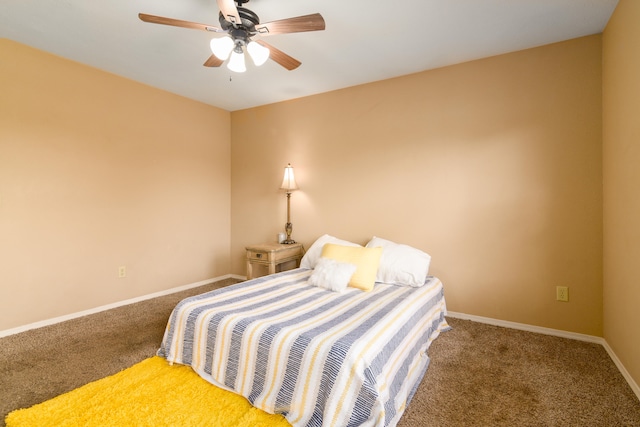 bedroom with ceiling fan and carpet flooring