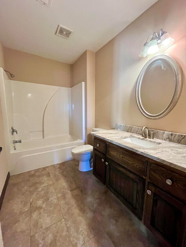 full bathroom with bathing tub / shower combination, vanity, and toilet