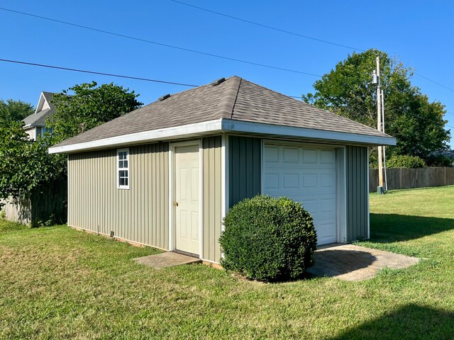 view of outdoor structure featuring a yard