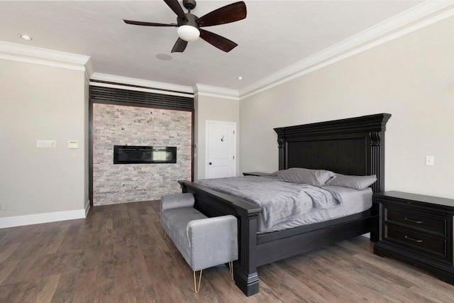 bedroom with ceiling fan, dark hardwood / wood-style flooring, and ornamental molding