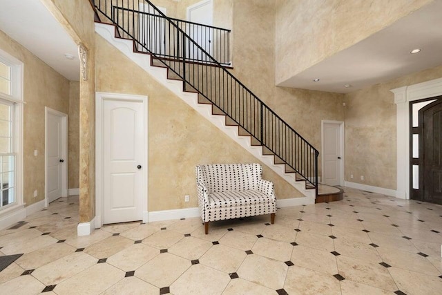 foyer with a high ceiling