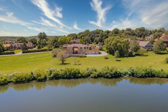 drone / aerial view with a water view