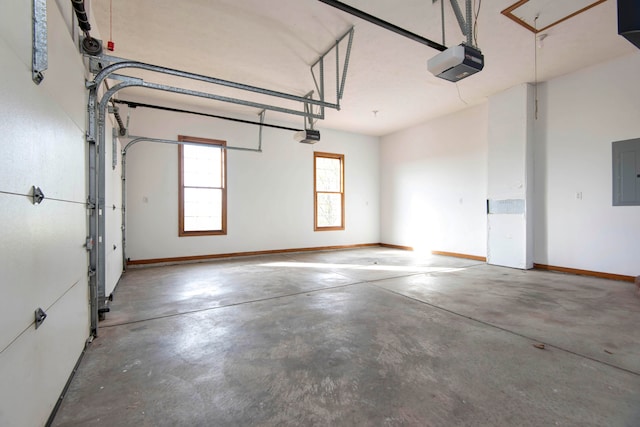 garage featuring a garage door opener and electric panel