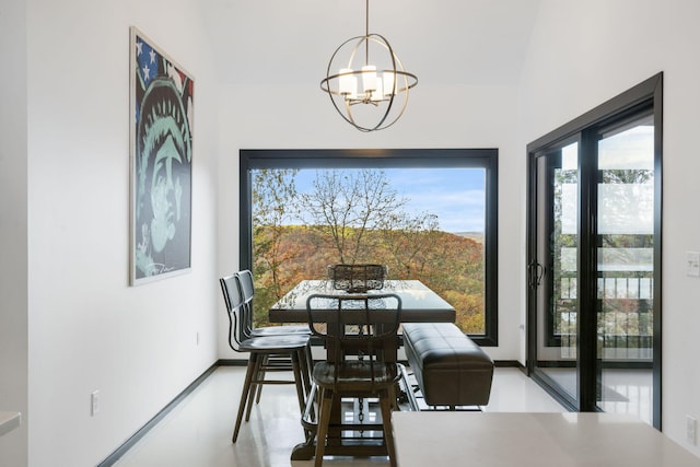 dining space featuring a chandelier