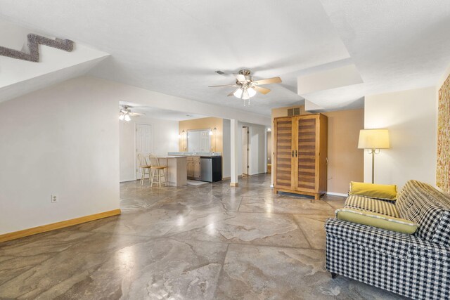 living room featuring ceiling fan